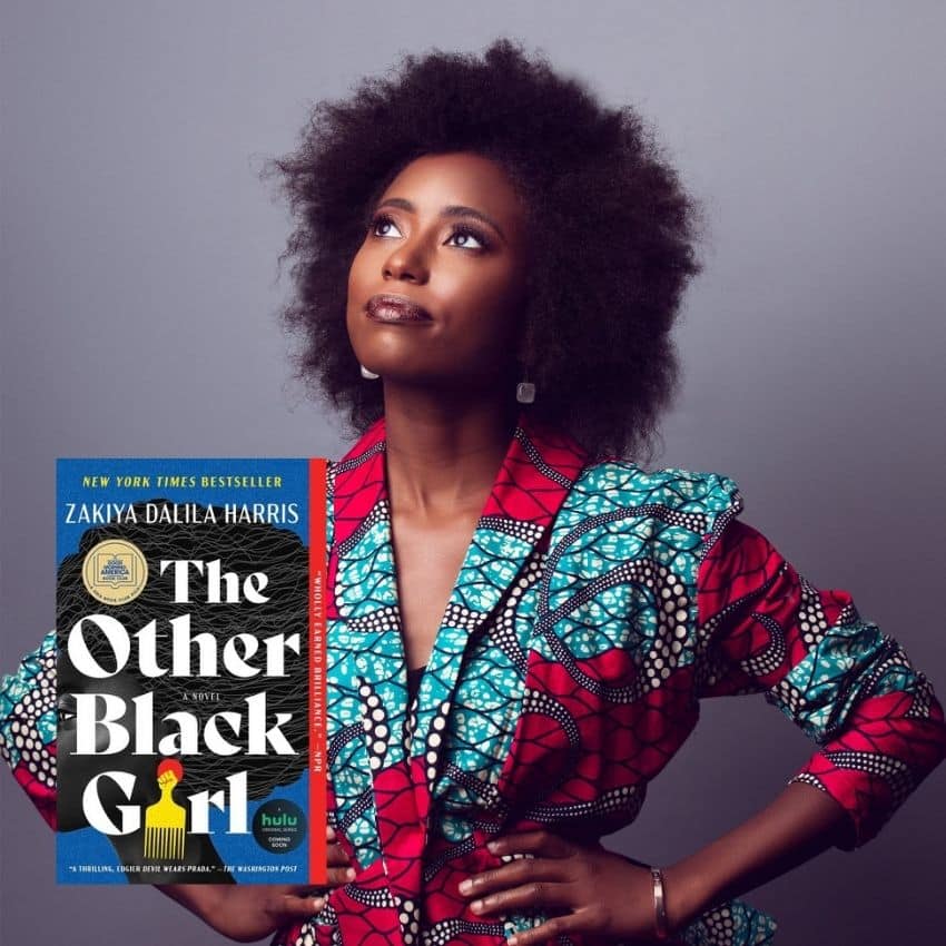 Zakiya Dalila Harris with her book The Other Black Girl